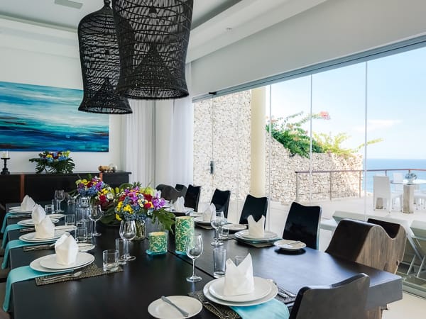 Grand Cliff Front Residence - Living room dinner table